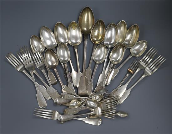 A matched part canteen of George IV and later silver, fiddle pattern cutlery and two plated items of flatware, 61.5 oz.